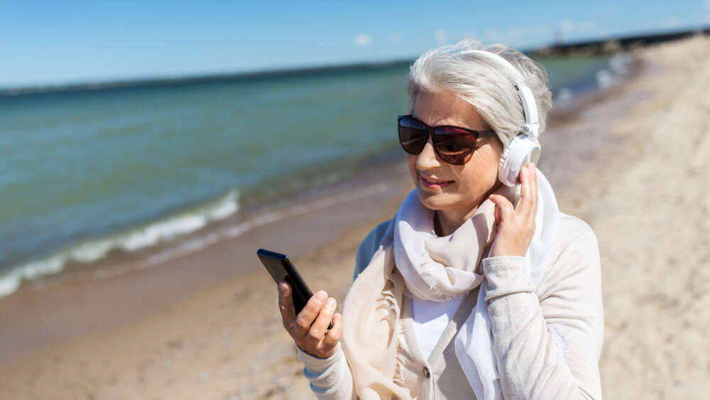 Woman listening to podcast