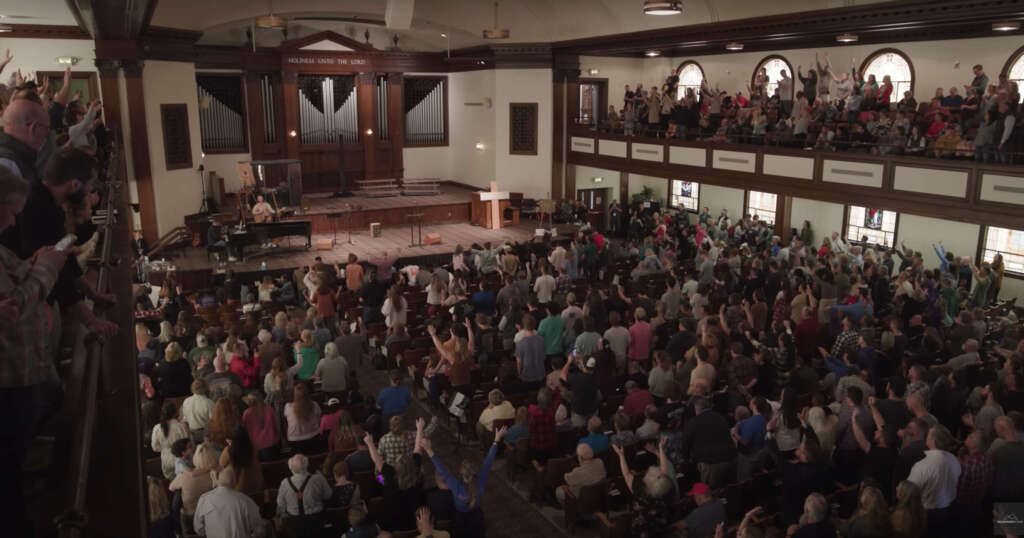 Worshippers cram Asbury's auditorium