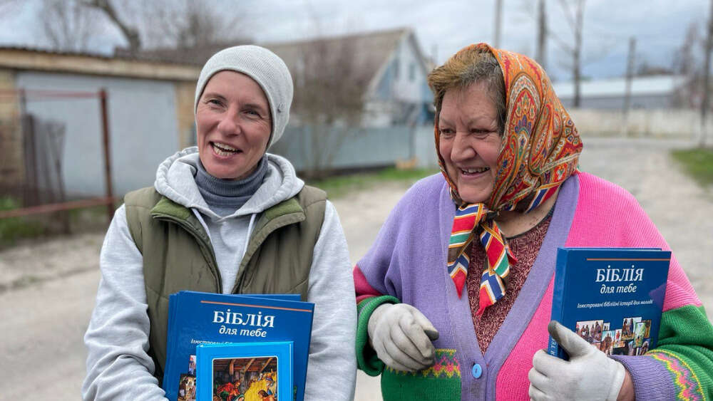 Ukrainian women with Bibles