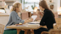 Two women at table