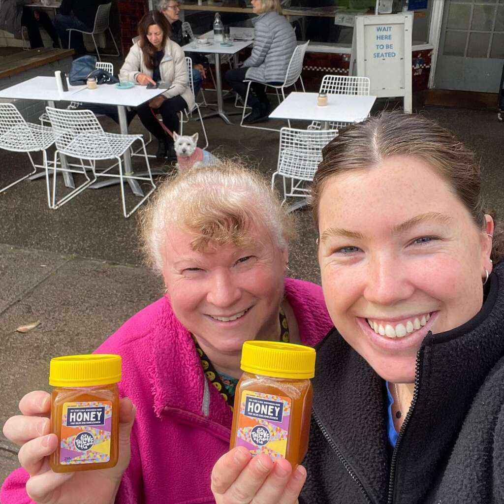 Karina and Hannah collect their For the Love of Good honey from Adeney Cafe, Kew.