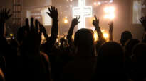 Young people worshipping