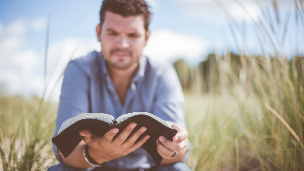 Man reading Bible