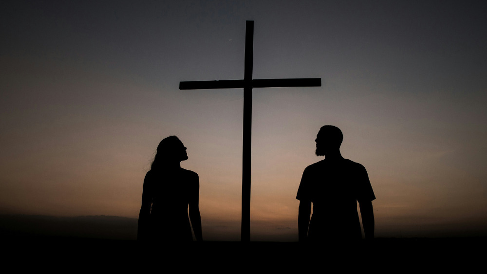 Lent people looking at cross