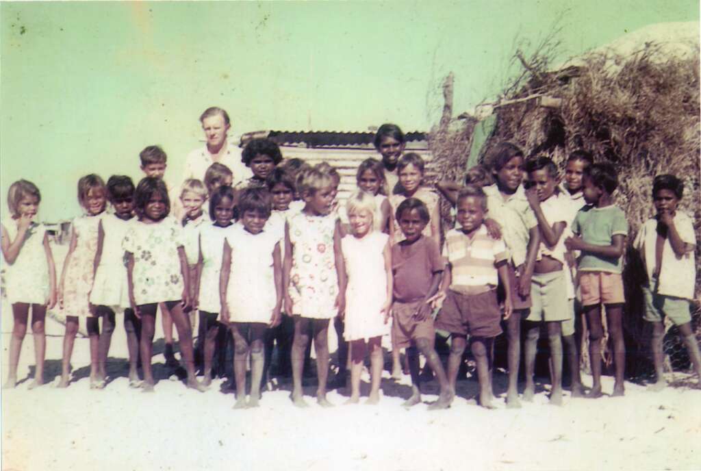 Francine in second row, behind boy in a purple T-shirt, at the beach school at One Arm Point, circa 1973
