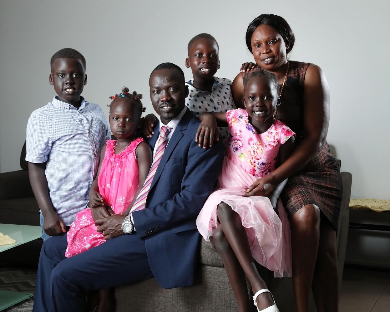 Elijah Buol, his wife Ashol and their children