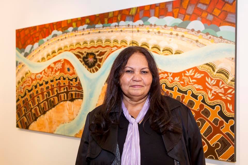 Ngardarb Francine Riches in front of her artwork, 2017